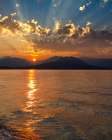 USA, Washington State, Seabeck. Sunset over Hood Canal and Olympic Mountains. Art Print